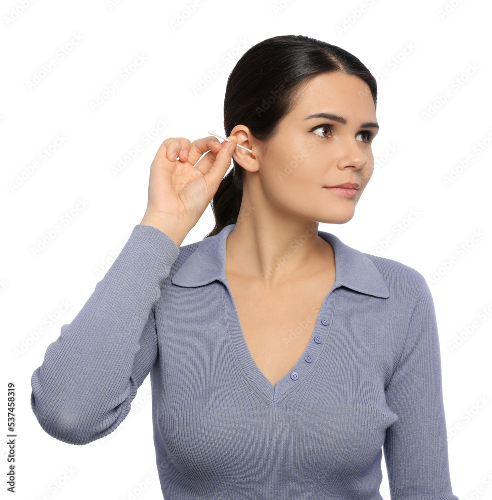 Young woman cleaning ear with cotton swab on white background Young woman cleaning ear with cotton swab on white background