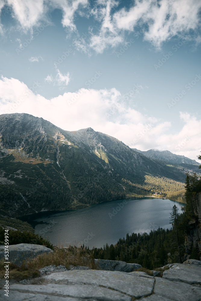 Fototapeta premium Beautiful lake in the mountains. Morskie Oko pond in the Tatra Mountains, Poland, Europe. Concept of the destination traveling ideal resting place.