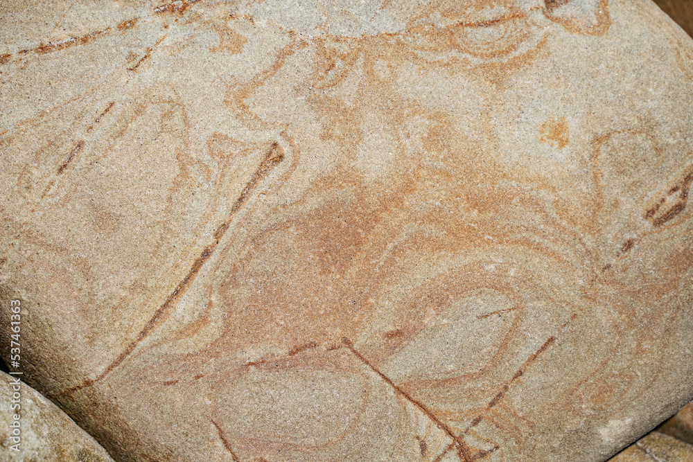 Beach stone texture from Santa Barbara California. Natural beige and orange high quality background Beach stone texture from Santa Barbara California. Natural beige and orange high quality background