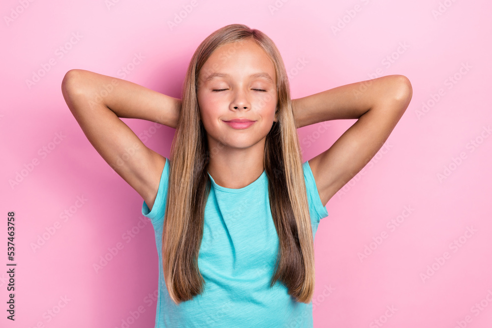 Photo of pretty adorable little child dressed teal t-shirt arms behind head sleeping naping isolated pink color background