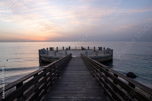 the roundabout overlooking the sea and the beach of Avola with the splendid colors of sunrise