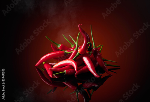 Red chili pepper with smoke.