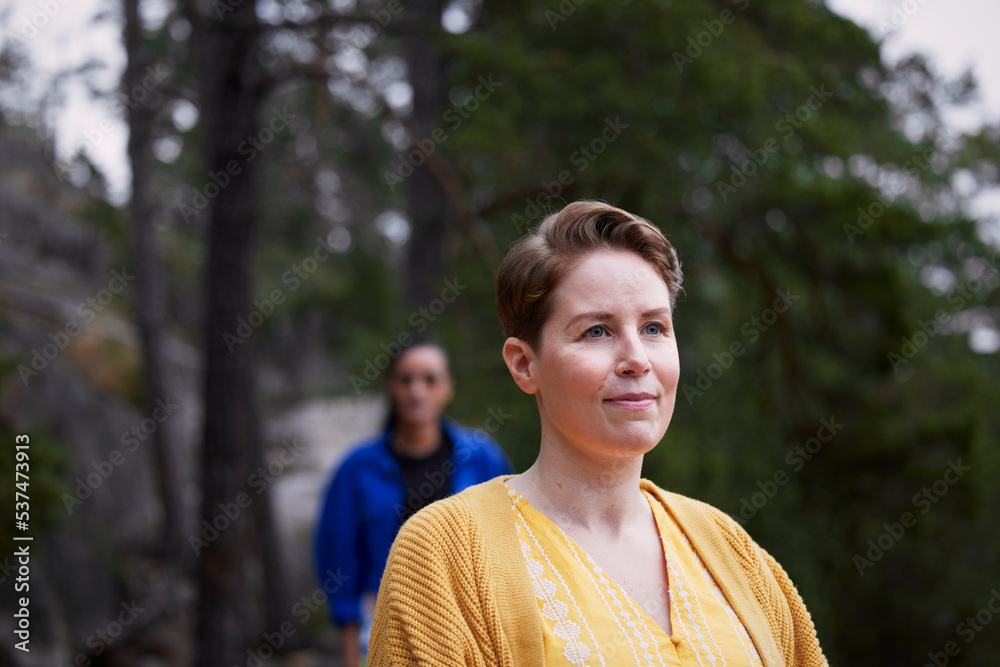 Woman looking at view in nature Woman looking at view in nature