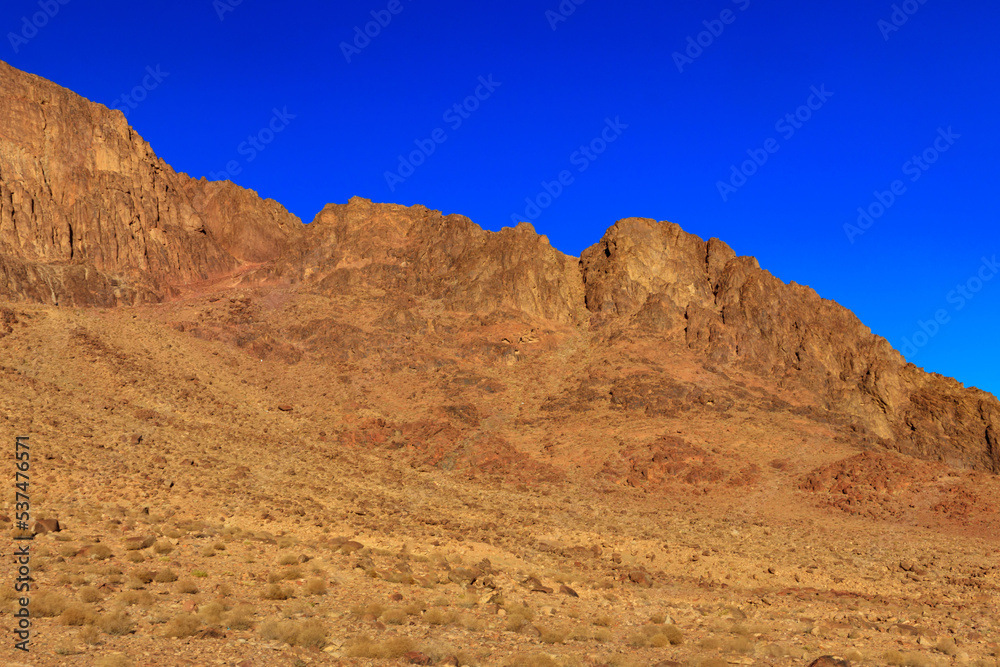 View of the rocky Sinai mountains and desert in Egypt View of the rocky Sinai mountains and desert in Egypt
