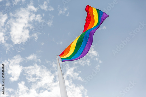 Rainbow flag in wind photo