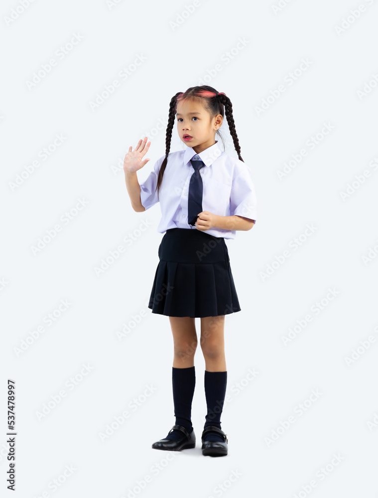 Asian junior school girl in student uniform standing full length white background. Asian junior school girl in student uniform standing full length white background.