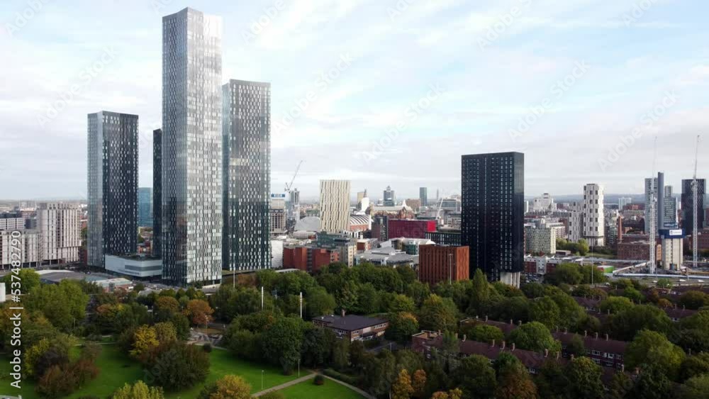 Manchester city skyline aerial view across modern Hulme high rise skyscraper apartment offices Manchester city skyline aerial view across modern Hulme high rise skyscraper apartment offices
