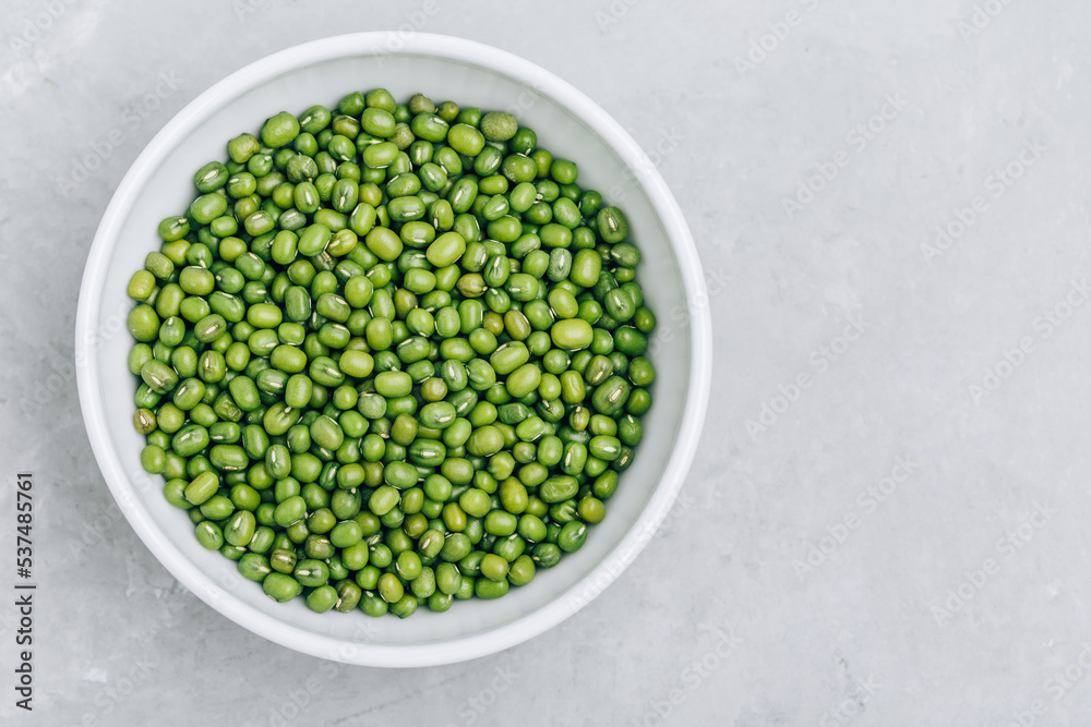 Green Gram. Organic Mung Beans in bowl on gray stone background. Green Gram. Organic Mung Beans in bowl on gray stone background.