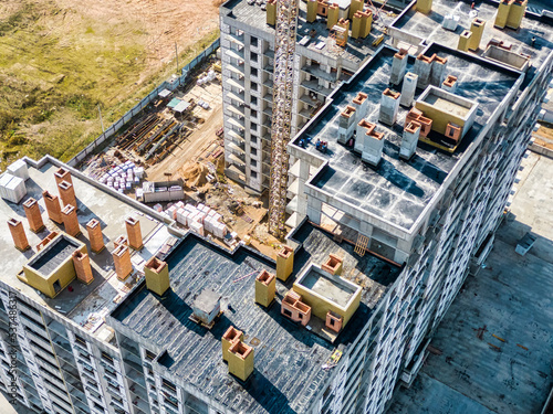 Monolithic frame construction of the building. Solid walls of concrete. Shooting from a drone. Modern construction of a residential building. construction site close up. View from above. © Anoo