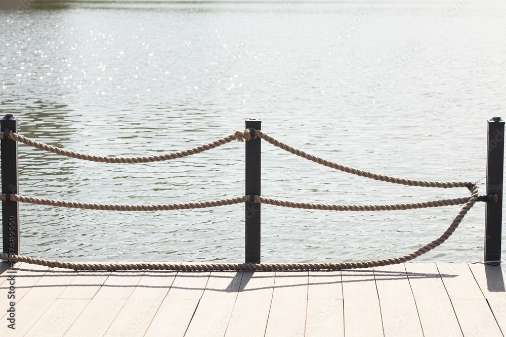 Obraz premium River pier on a summer day