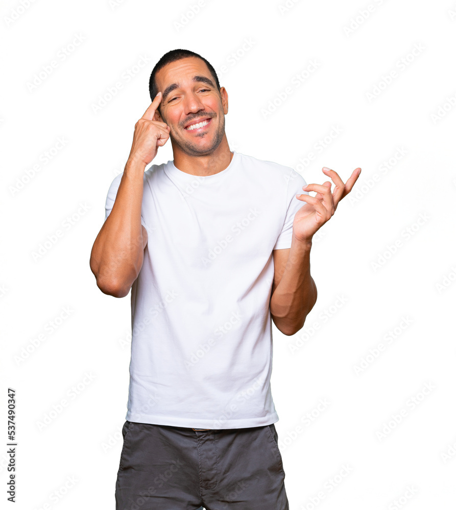 Fototapeta premium Surprised young man doing a gesture of concentration