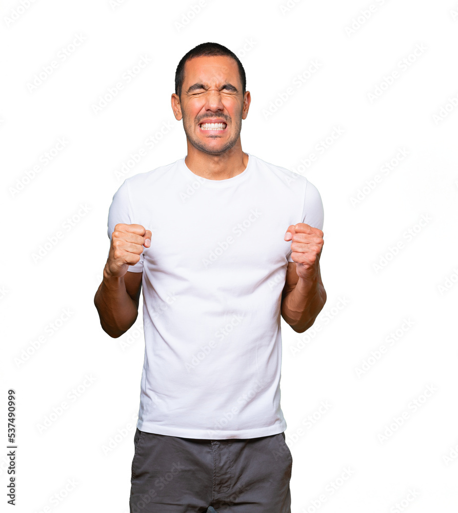 Concerned young man with a stress gesture Concerned young man with a stress gesture