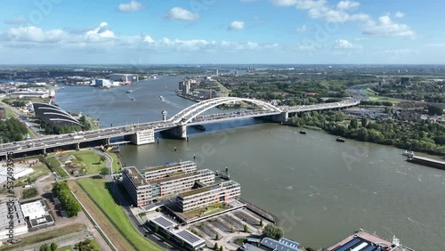 The Van Brienenoordbrug bridge over the Nieuwe Maas in the Rotterdam, The Netherlands part of IJsselmonde and Kralingen-Crooswijk on the east side of Rotterdam, in the Dutch province of South Holland. photo