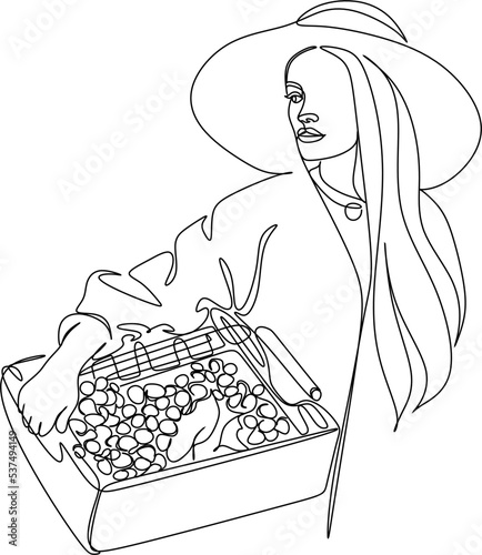 Beautiful woman eating grapes vector illustration. A woman holds a basket with grapes.