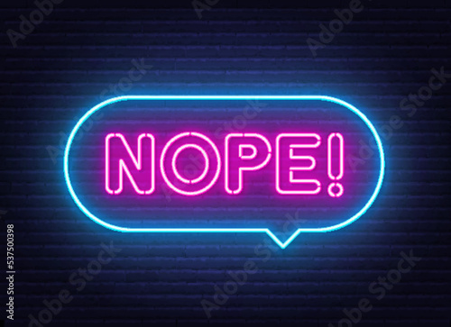 Nope neon sign in the speech bubble on brick wall background