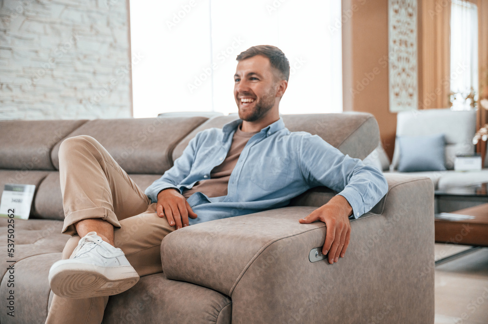 Sitting and enjoying. Customer visiting the sofa and bed store. Looking for update Sitting and enjoying. Customer visiting the sofa and bed store. Looking for update