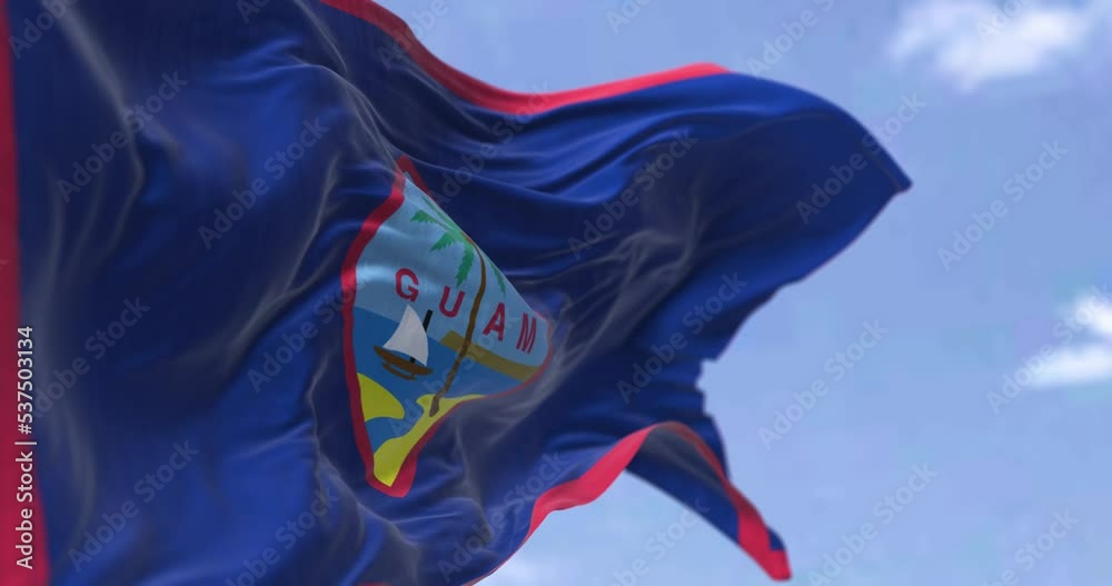 Flag of Guam waving in the wind on a clear day