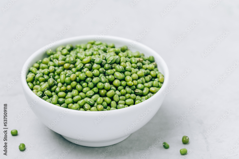 Green Gram. Organic Mung Beans in bowl on gray stone background. Green Gram. Organic Mung Beans in bowl on gray stone background.