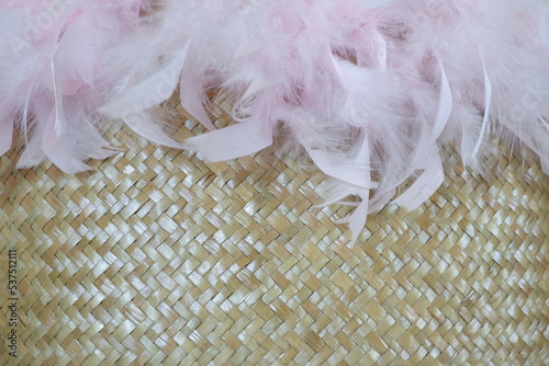 Pink feathers on weave hyacinths