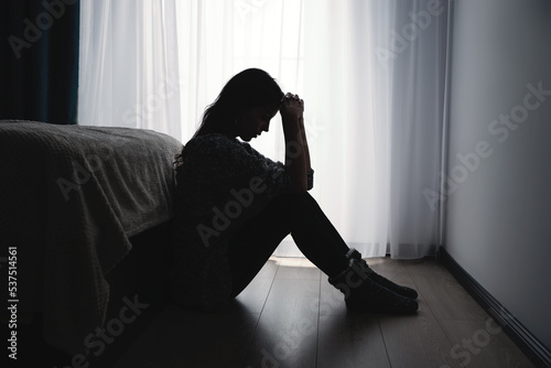 Depressed woman. Sadness and headache concept