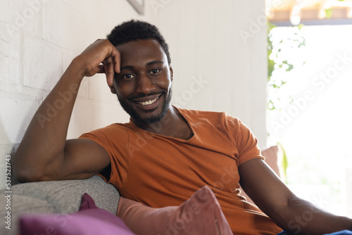 Portrait of happy african american man looking at camera and smiling