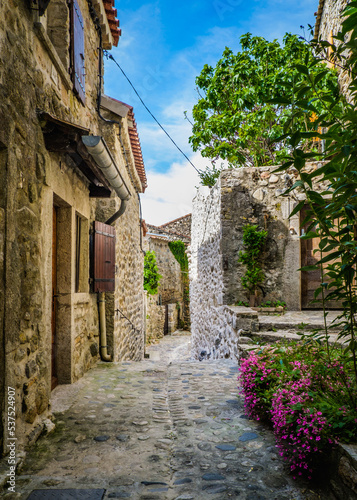 View on the narrow but beautiful cobblestone street of the medieval village of Lanas  in the south of France  Ardeche 