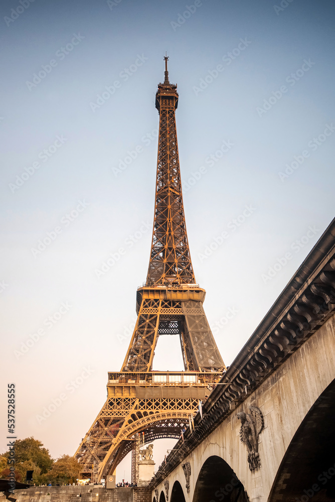 Fototapeta premium The Eiffel Tower in Paris France, at sunset