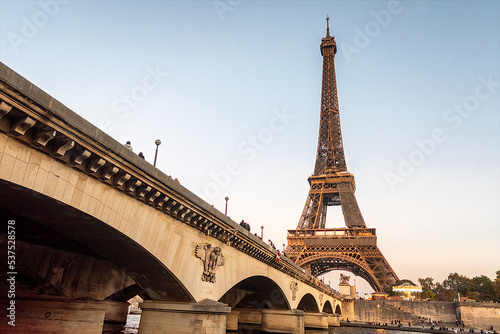 A lighted Eiffel Tower in Paris France, at sunset © Allen.G