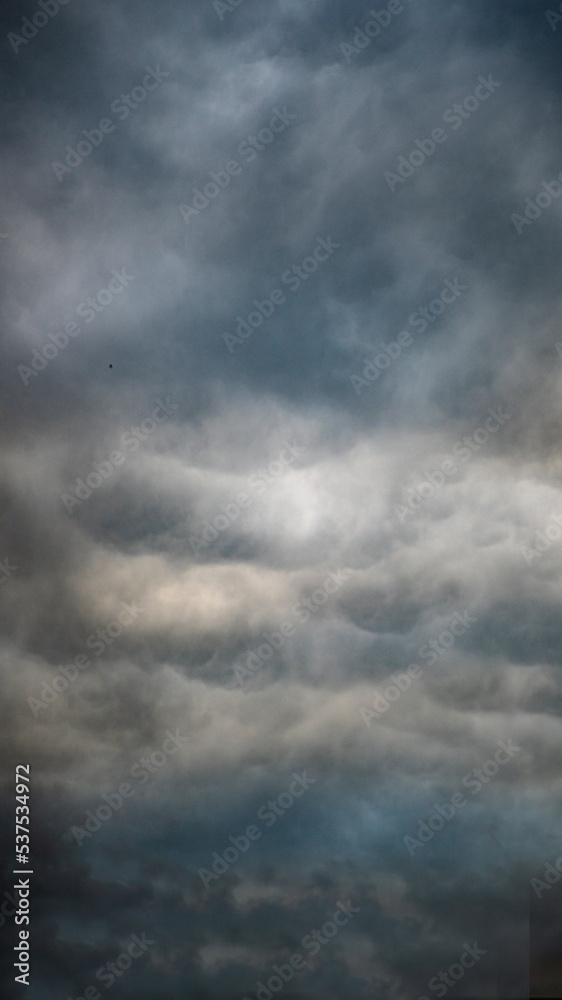 Texture of bright blue dramatic cloudy sky. Texture of bright blue dramatic cloudy sky.