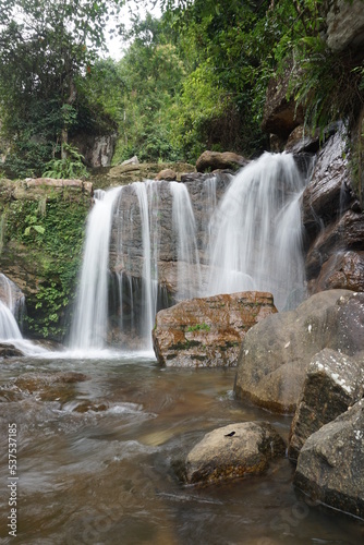 waterfall in the woods long exposure
