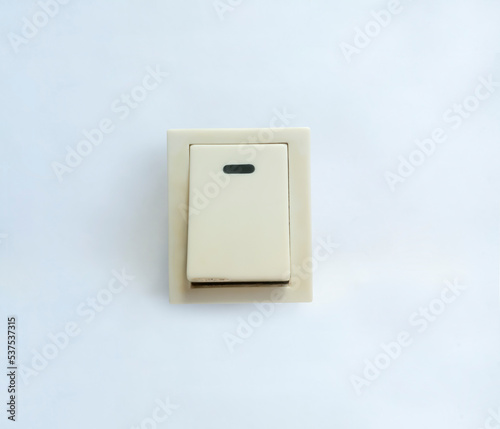 white electric switch on white background