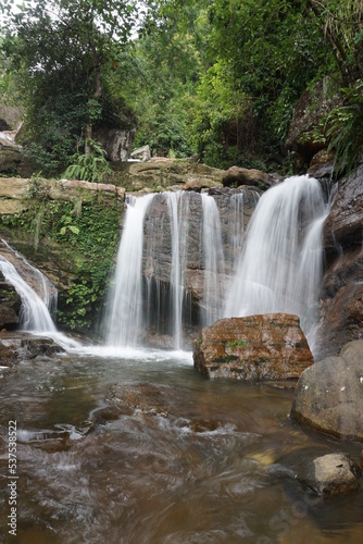 waterfall in the woods long exposure
