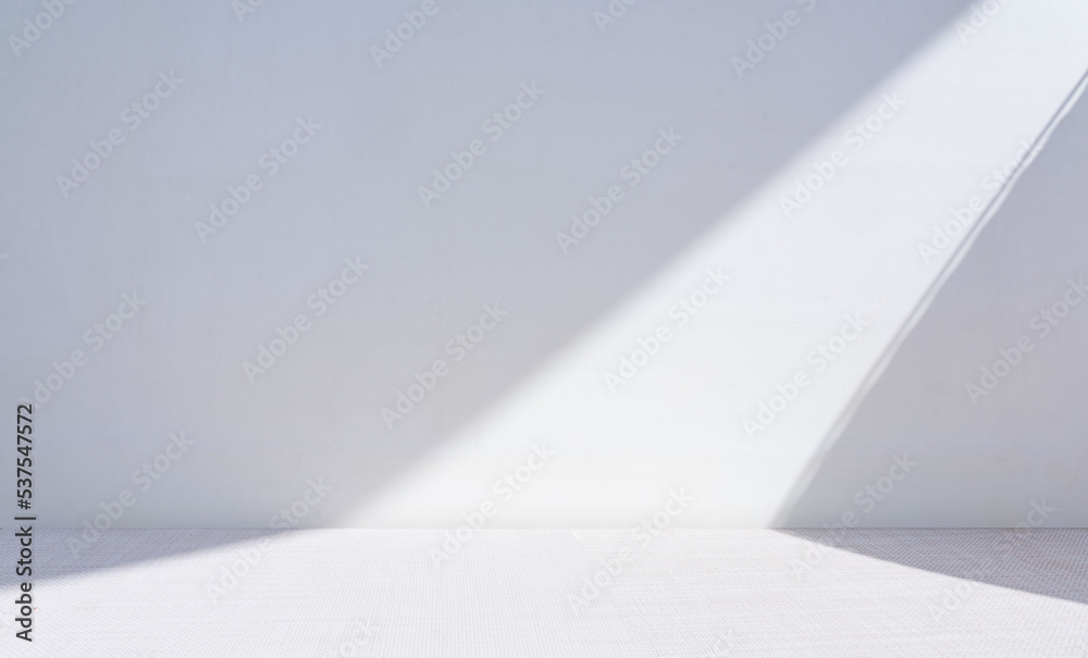 Original widescreen background image in minimalistic design with geometric shapes of light and shadow for presentation of various products in grey-blue tones. - obrazy, fototapety, plakaty 