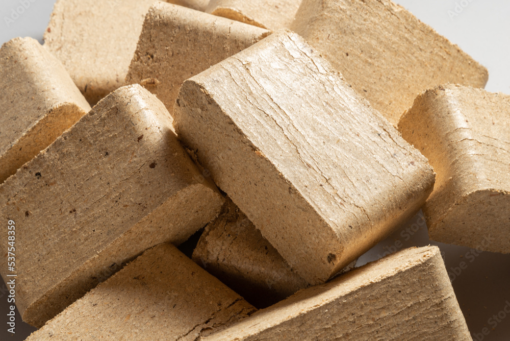 Lot of Wood Briquettes for heating,  textured background