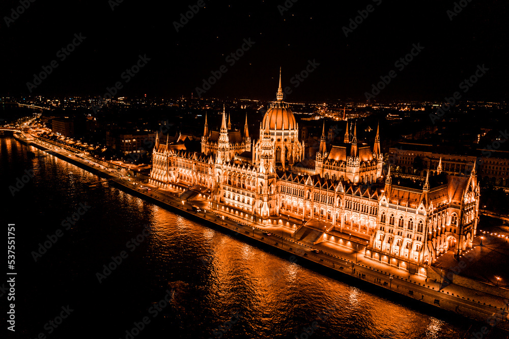 Aerial Drone Photo - Hungarian Parliament Building lit up at night.  Budapest, Hungary