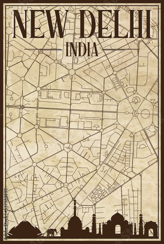 Brown vintage hand-drawn printout streets network map of the downtown NEW DELHI, INDIA with brown 3D city skyline and lettering