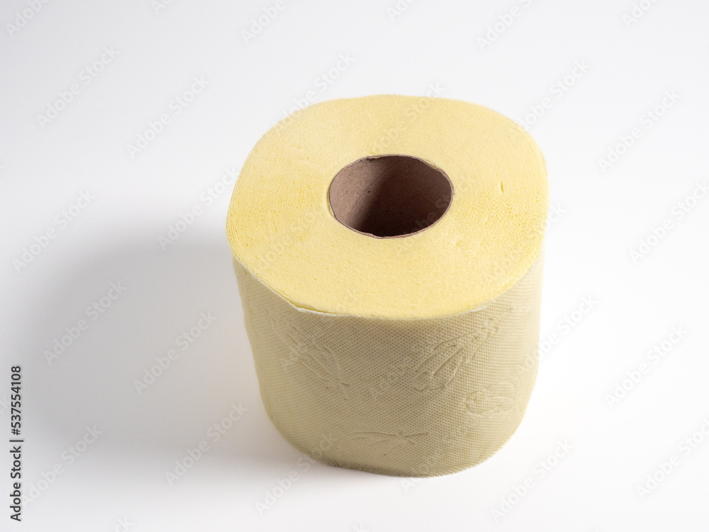 Roll of toilet paper on a light background. Roll of toilet paper on a light background.