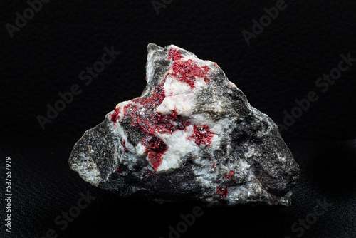Konstfotografi Real raw red Cinnabar stone chunk macro isolated on black surface