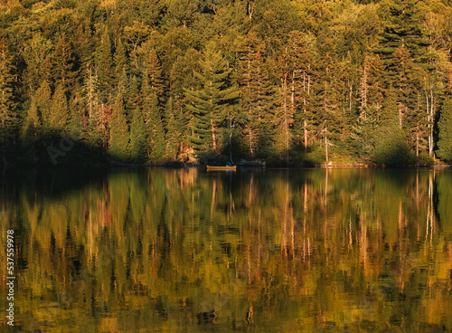 Canoe on calm lake