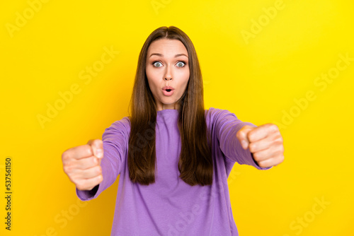 Photo of young crazy nervous woman pouted lips excited open mouth driving abstract steering wheel car accident isolated on yellow color background