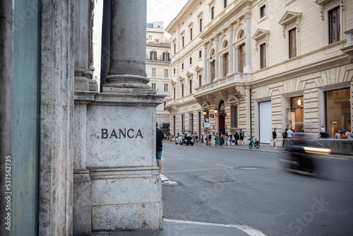 Wallpaper Mural The Base of a Column with the Italian Word Banca that means Bank in the Center of Rome Torontodigital.ca