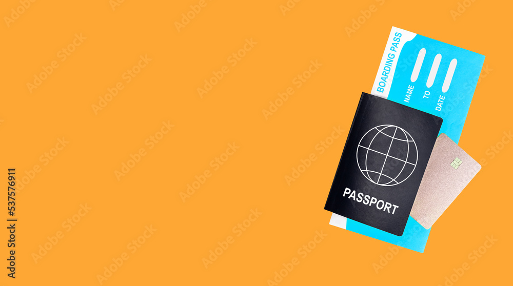 Banner for plane travel ads with copy space for text. Abstract global passport Id document, air ticket and bank card on orange background