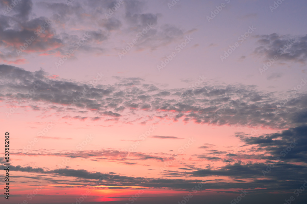 Fototapeta premium Twilight sky with effect of light pastel tone. Colorful clouds on the dramatic sunset sky