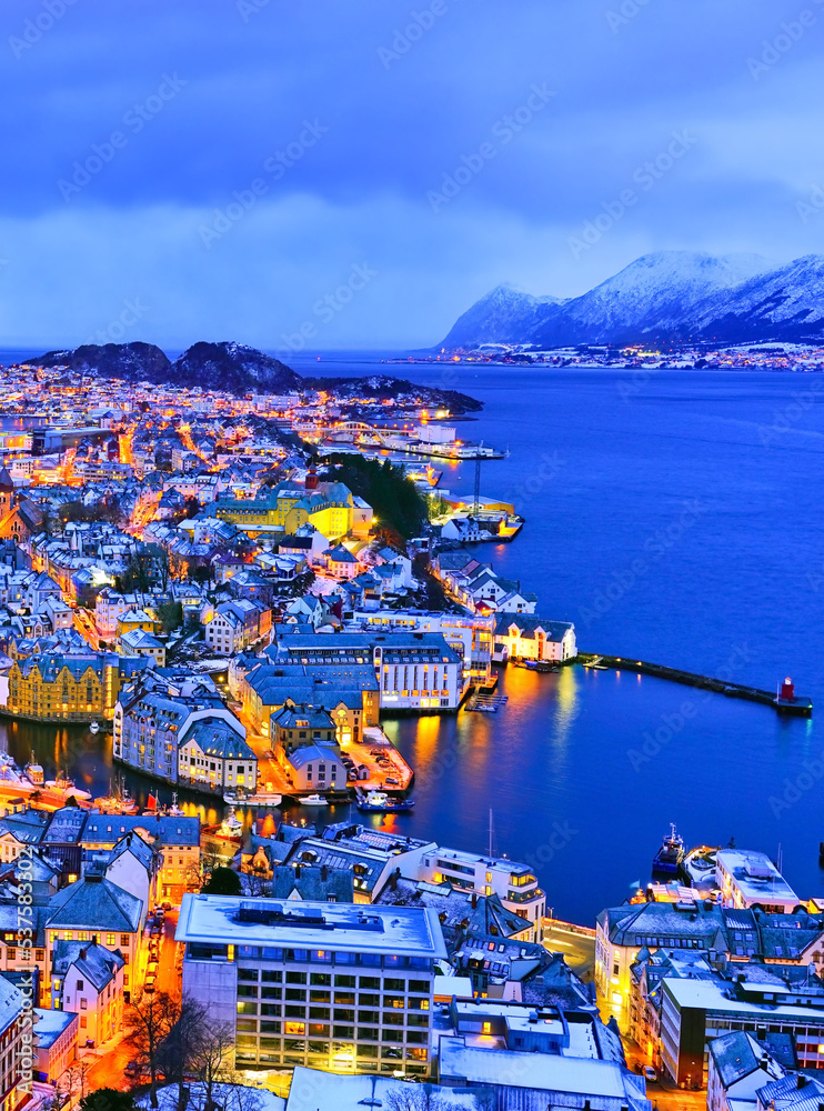 View of Alesund, Norway at night in winter.