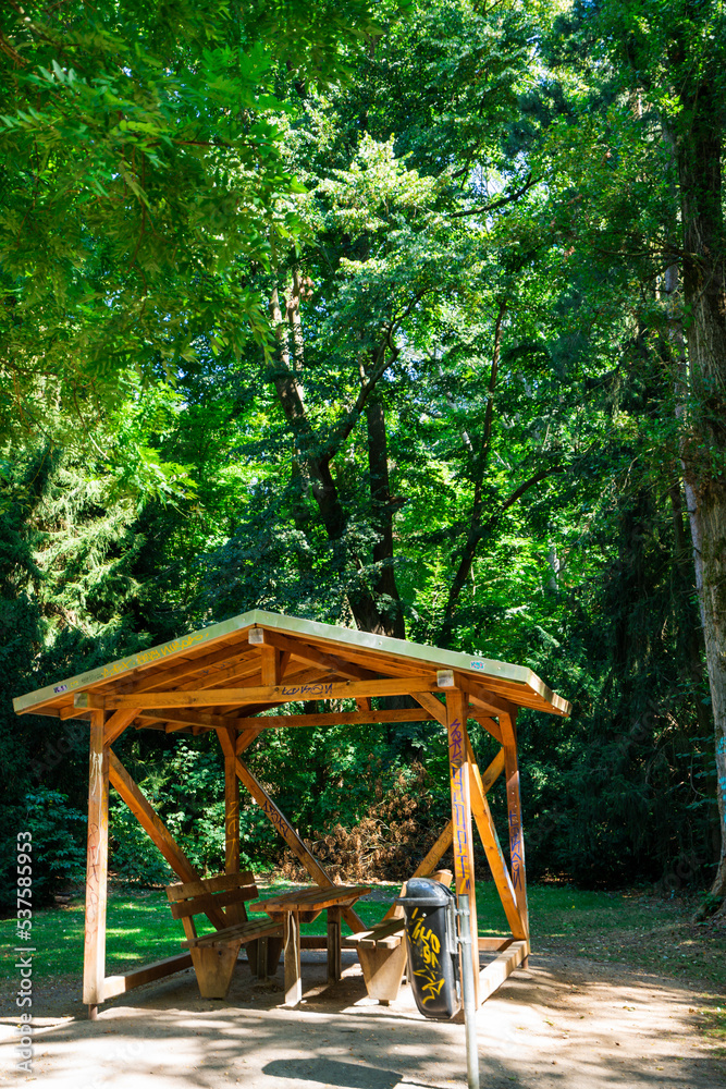 Gazebo On Grassy Landscape. Empty Bench In Park. Gazebo On Grassy Landscape. Empty Bench In Park.