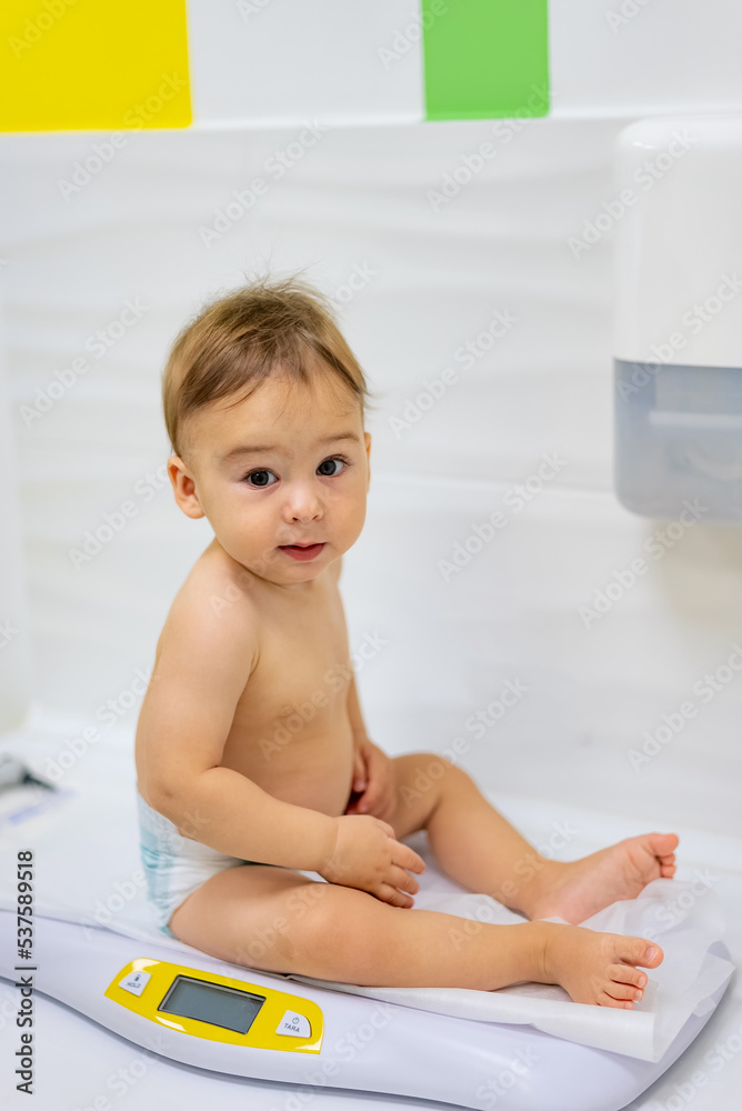 Cheerful small child smilling. Cute little boy sitting. Cheerful small child smilling. Cute little boy sitting.