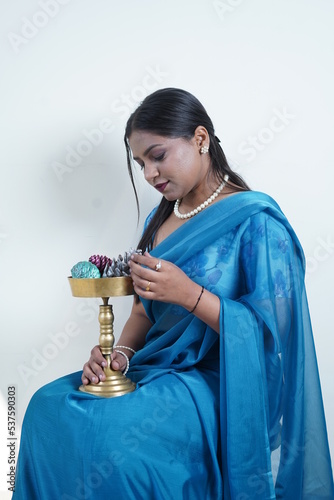 dusky girl wearing blue saari photo