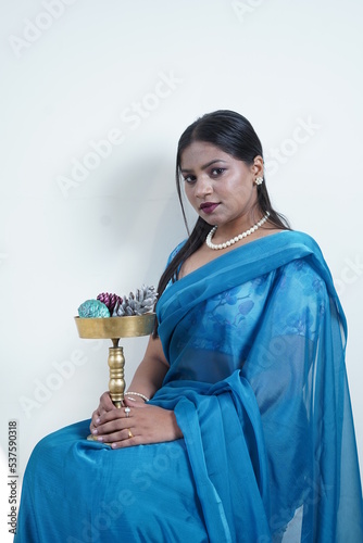 dusky girl wearing blue saari photo