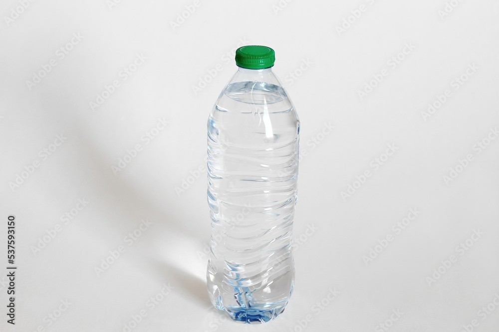 blue plastic purified mineral water bottle isolated on white background blue plastic purified mineral water bottle isolated on white background