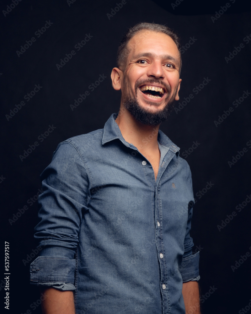 Fototapeta premium White man smiling, in studio, gray hair